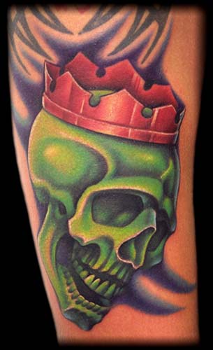 Looking for unique  Tattoos? crowned green skull